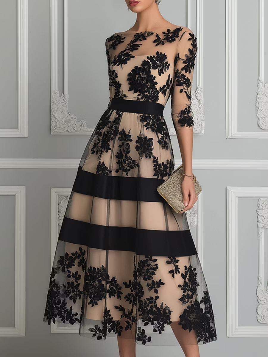 Elegancka czarna sukienka midi o kroju A z koronki