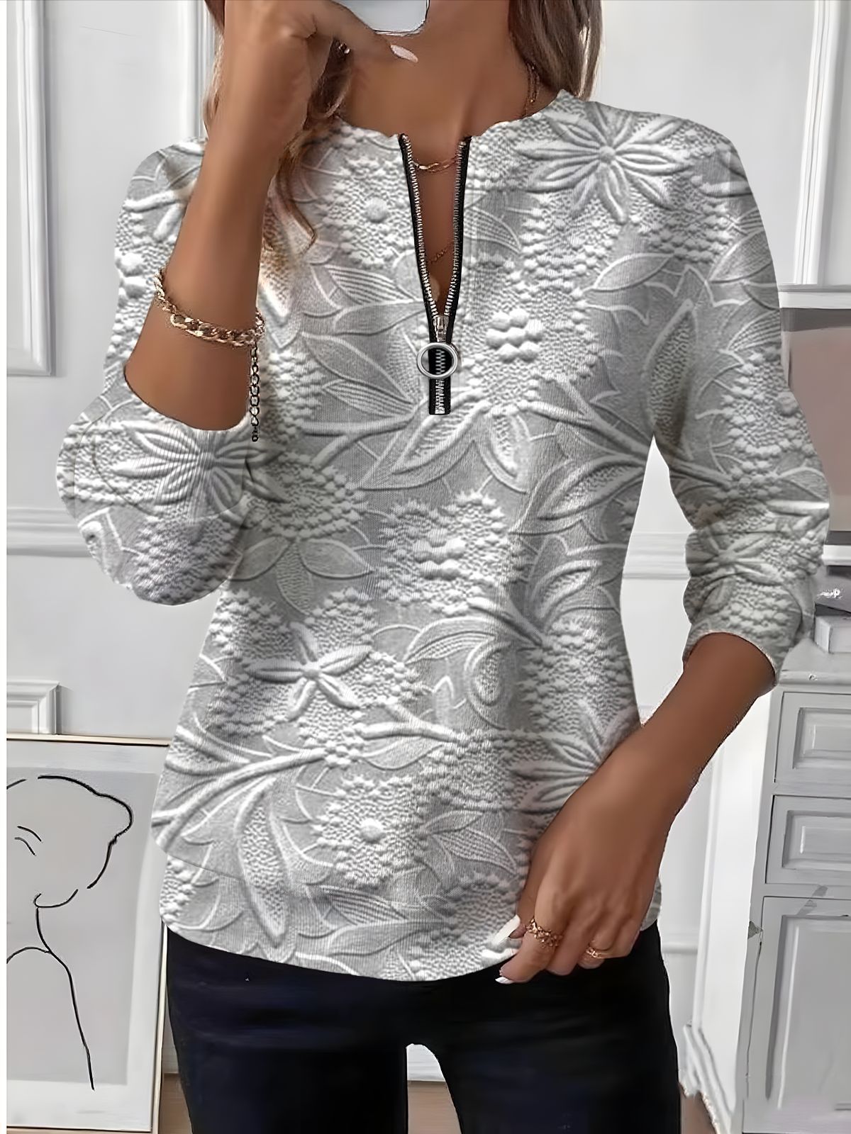 Astrid – Bluza z zamkiem i teksturowanym kwiatowym wzorem